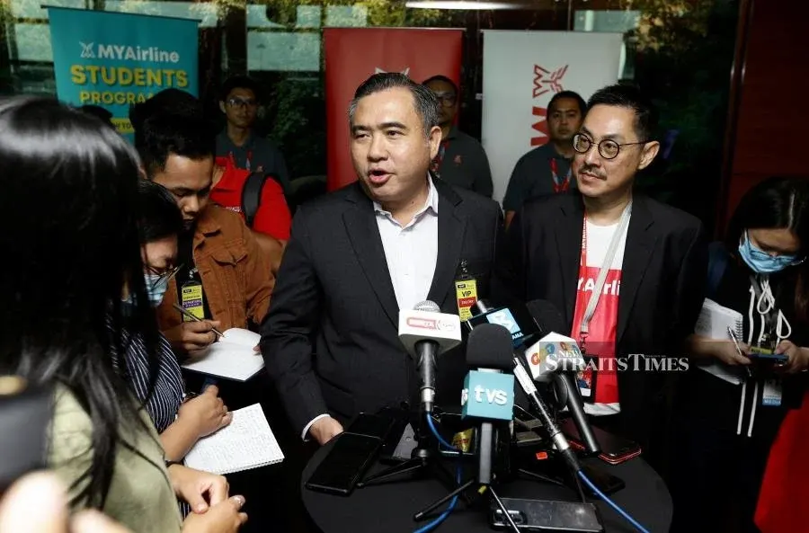 Loke (left) speaking to reporters at the the launch of MyAirline student discount programme. - NSTP/MOHD FADLI HAMZAH