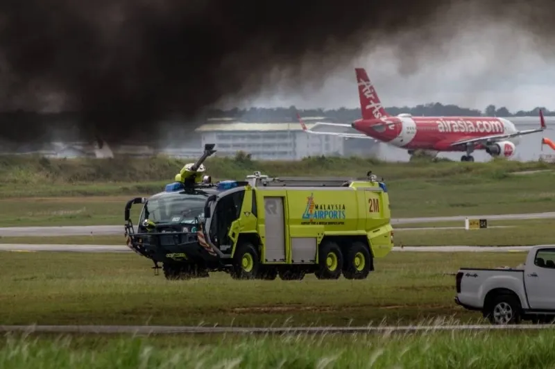 A Malaysia Airport Fire and Rescue Service (AFRS) vehicle arrives at a mock plane crash site during an airport emergency exercise at Kuala Lumpur International Airport (KLIA) in Sepang, September 22, 2022. — Picture by Firdaus Latif