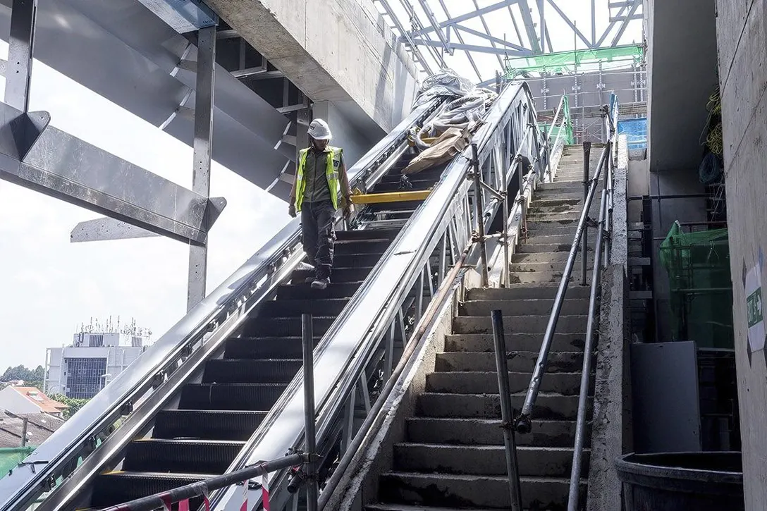 Staircases and escalators being built inside the Bandar Utama Station.