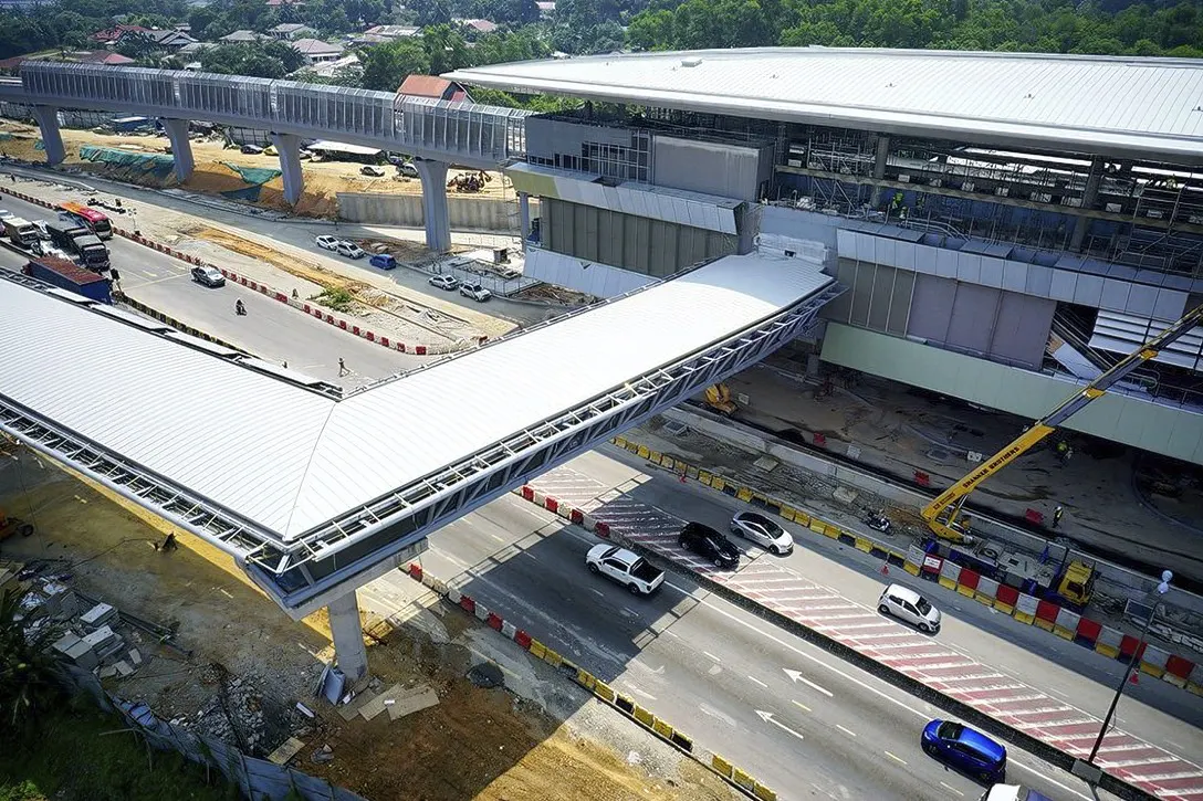 The pedestrian link bridge for commuters to get to the Kampung Selamat Station