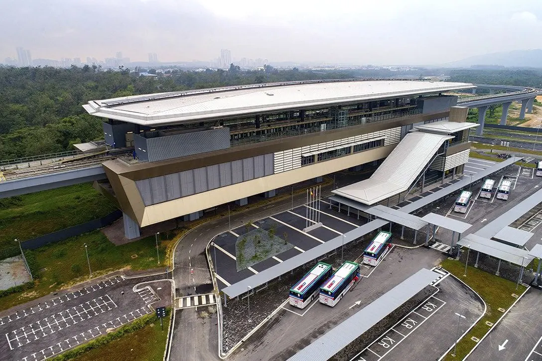 Aerial view of the Kwasa Sentral MRT Station with feeder buses parked at their parking bays.