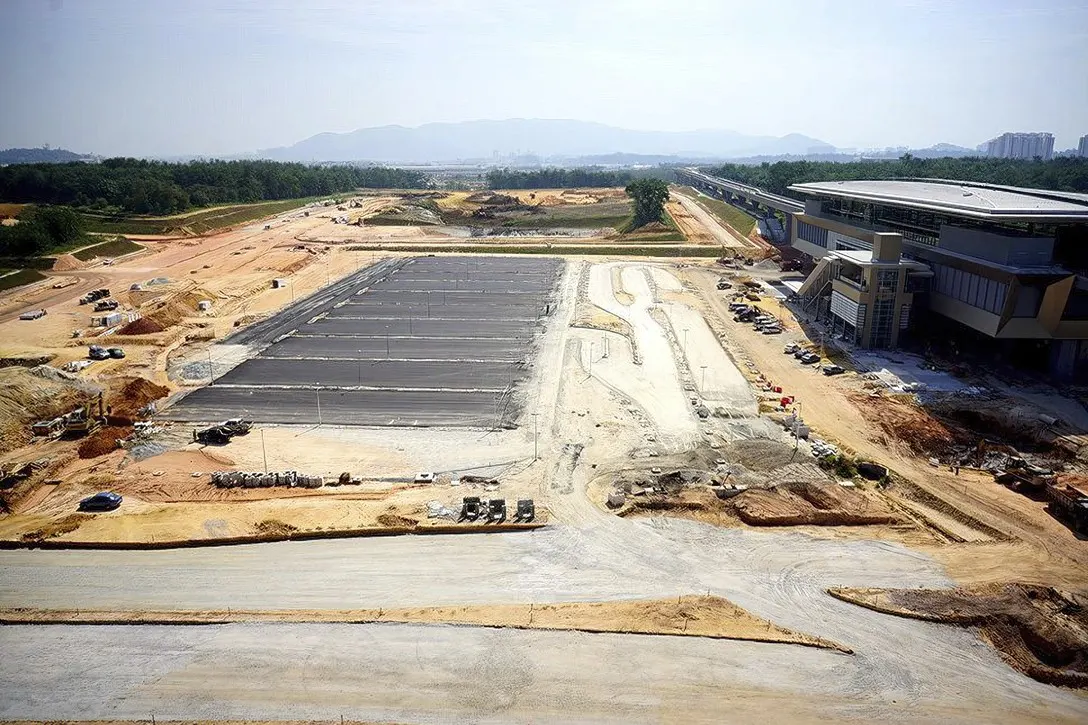 View of the Kwasa Sentral Station site where construction of the at grade parking is in progress.