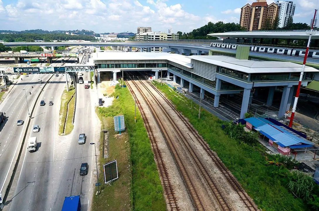 View of the completed Sungai Buloh MRT Station with the common concourse with the Sungai Buloh KTM Station over the KTM tracks