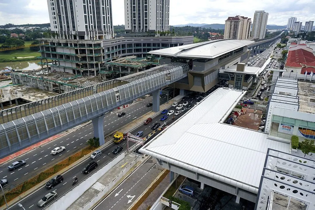 View of the Surian MRT Station with the pedestrian bridge at Sunway Nexis (right) being constructed.