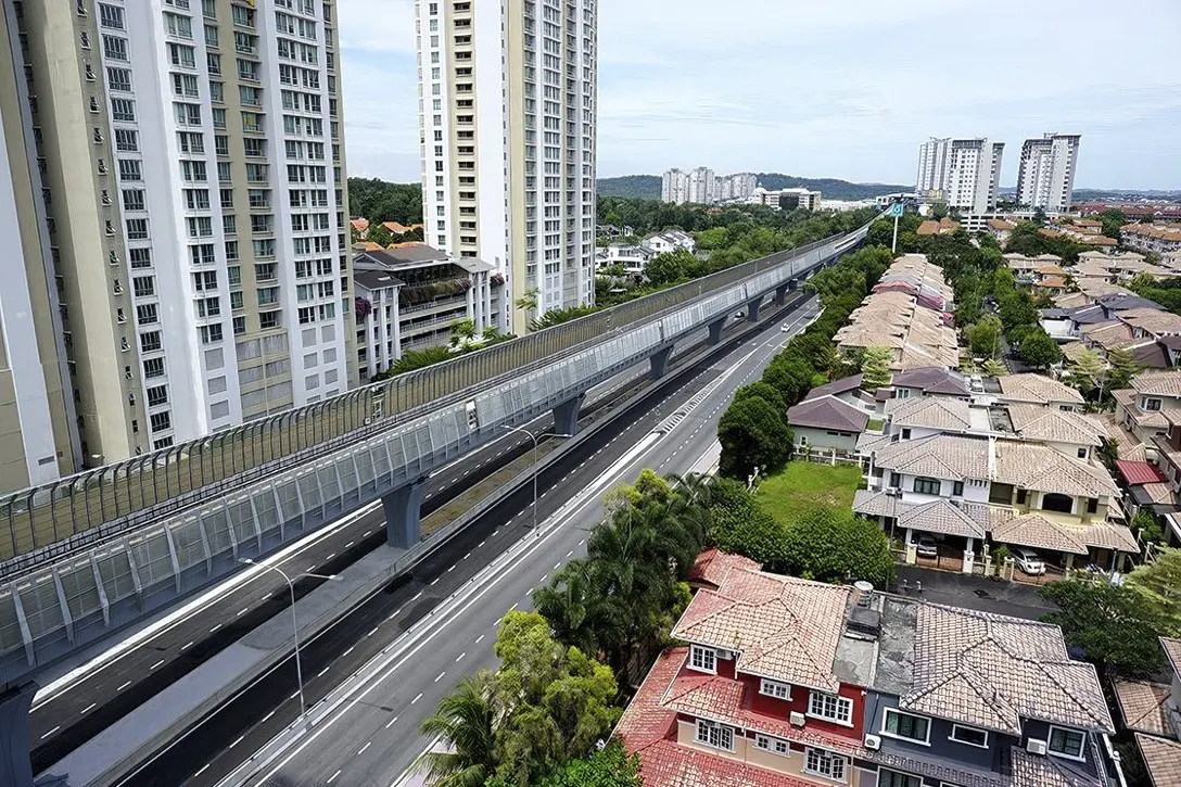 Noise barriers installed at the MRT guideway above the Persiaran Surian.