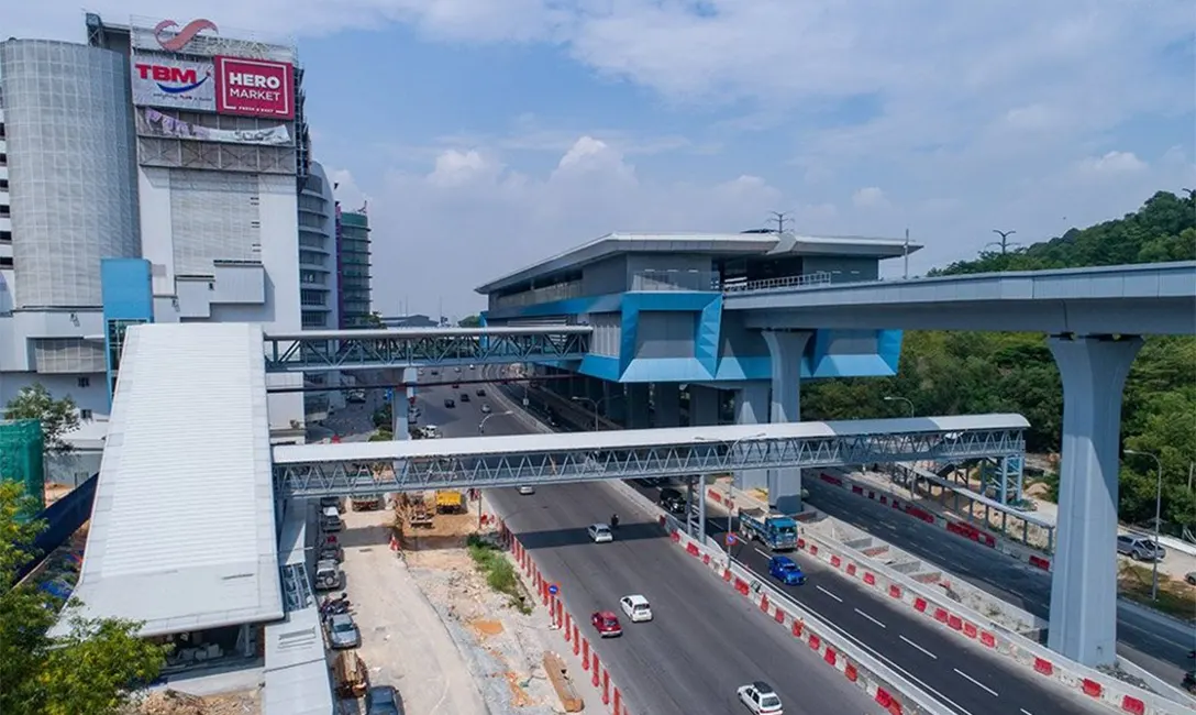 View of the entrance (left) and pedestrian link bridge to the Taman Connaught MRT Station