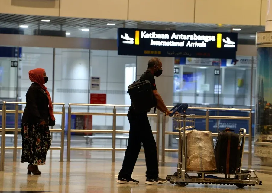 A Saudi Airlines aircraft from Jeddah, Arab Saudi was the first international flight to land at the Kuala Lumpur International Airport (KLIA) following the reopening of the country’s borders today. - BERNAMA pic.