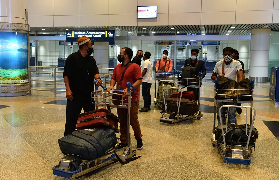 Travellers from overseas arrive at KLIA on April 1, 2022. — Bernama photo