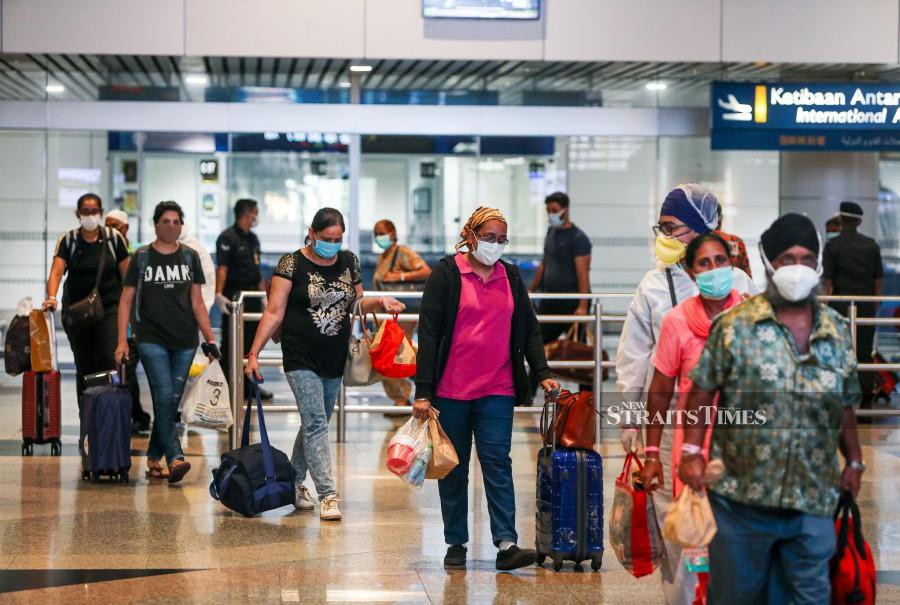 (File pic) A total of 1,062 Malaysians returned home via the Kuala Lumpur International Airport (KLIA) and klia2 on Sunday July 09, 2020 and were screened for Covid-19 upon arrival. Photo by LUQMAN HAKIM ZUBIR/NSTP