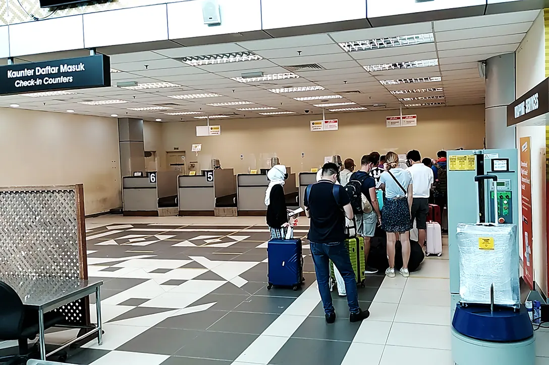 Passengers queuing up for checking-in