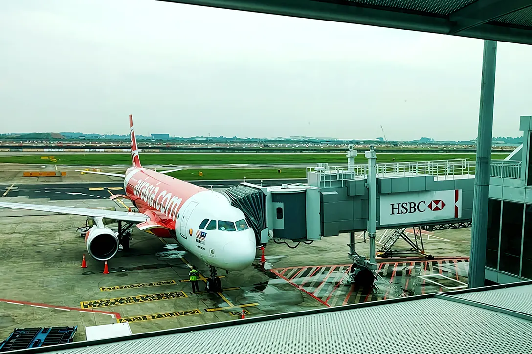 AirAsia flight connected to the Aerobridge