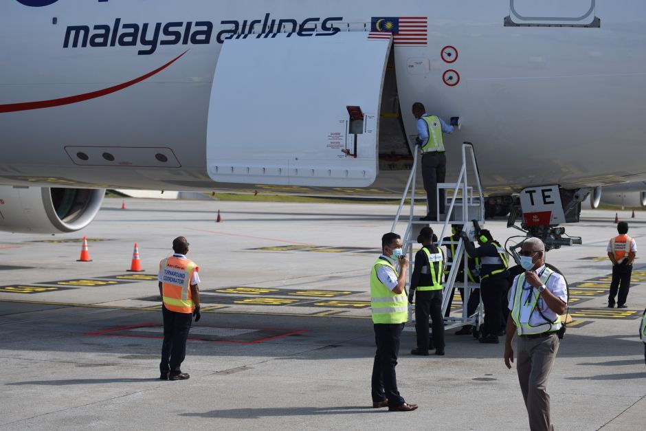 Plane carrying vaccines touches down at KLIA